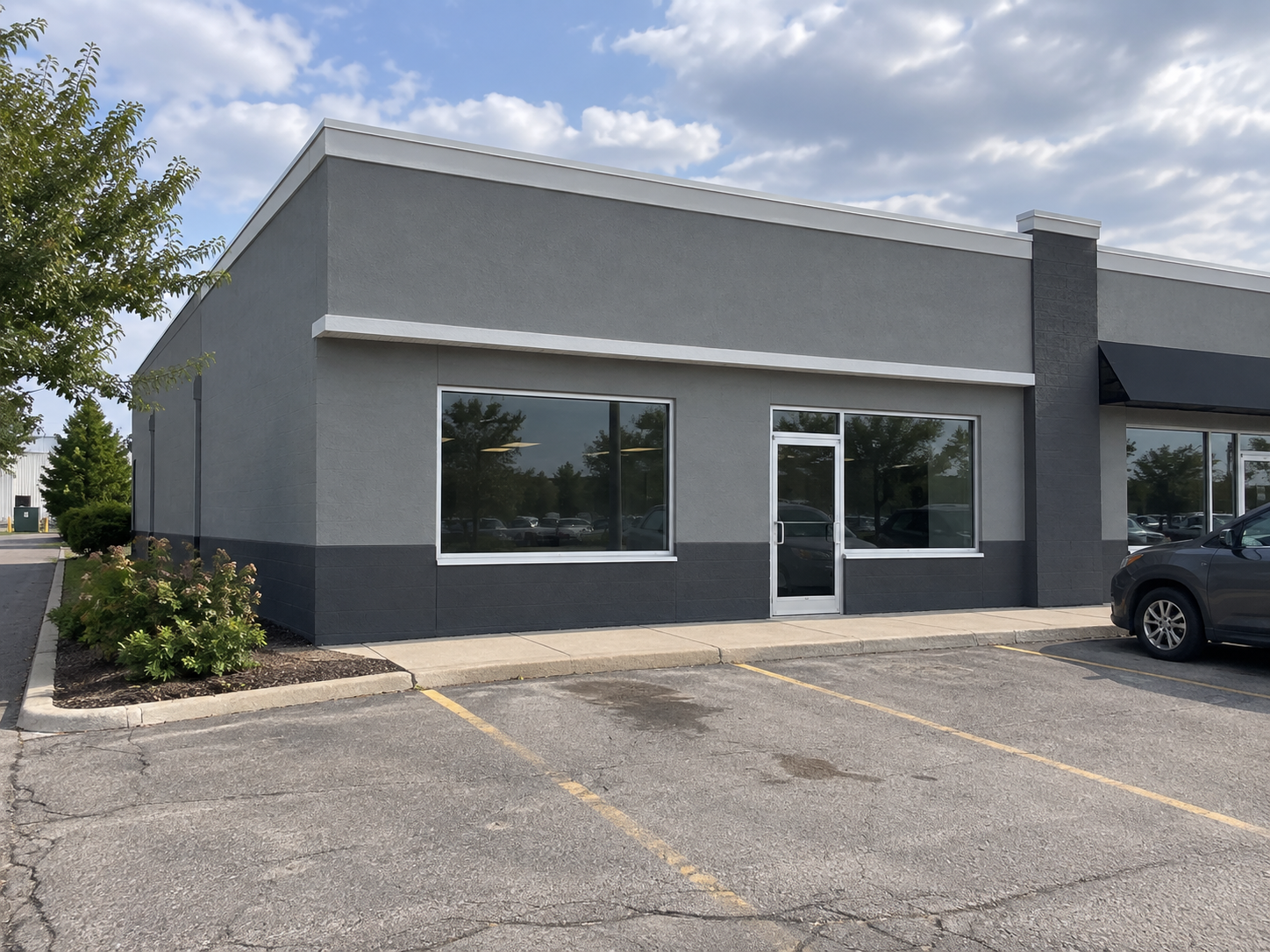 Completed commercial exterior painting project by PDG Contracting